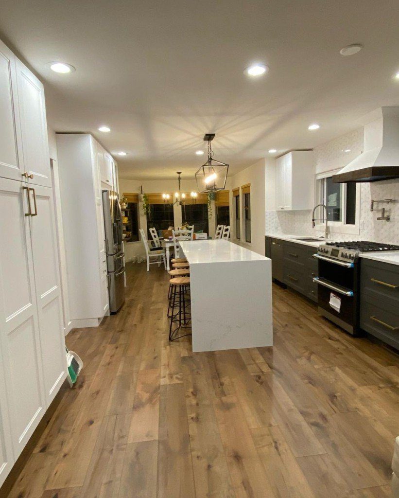 Completed Lion Heart open-concept kitchen remodel with island and dining area